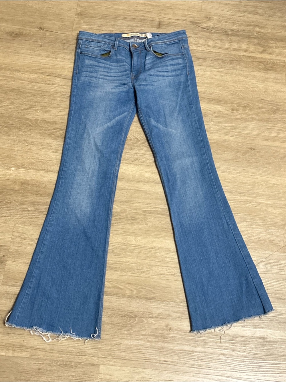 Zara Medium Blue Flared Jeans with Frayed Hem size 6